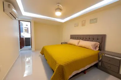 Cama o camas de una habitación en Departamento a 2 minutos de la playa