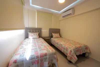 Cama o camas de una habitación en Departamento a 2 minutos de la playa