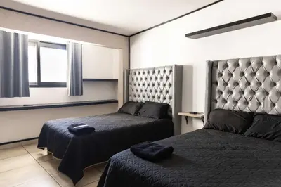 Cama o camas de una habitación en Family House with 4 Bedrooms Oaxaca