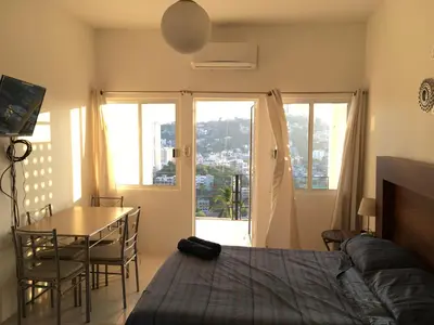 Cama o camas de una habitación en Departamento con vista al mar
