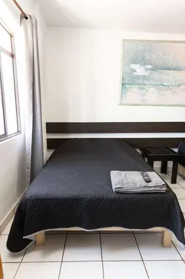 Cama o camas de una habitación en Bohemian Apartment in Oaxaca with 2 Bedrooms