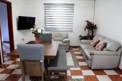 Zona de estar de Departamento Bugambilia