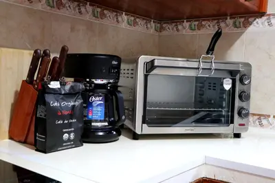 Una cocina o zona de cocina en Departamento Bugambilia