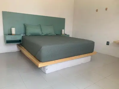 Cama o camas de una habitación en Villa Azul Pool House - Centro Oaxaca