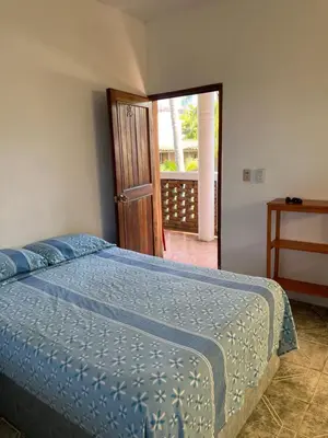 Cama o camas de una habitación en Cabañas Edda