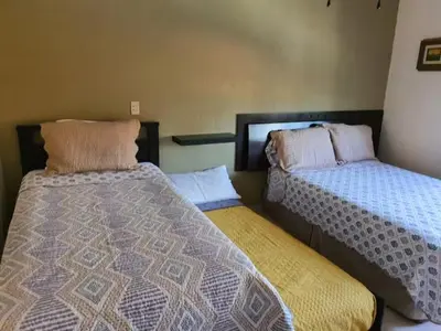 Cama o camas de una habitación en Casa Tulipanes