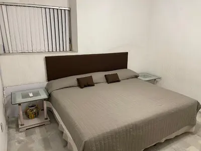 Cama o camas de una habitación en Depa con la Mejor Ubicación a 2 min de la Playa