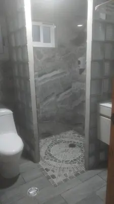 Un baño de Departamentos RomTen