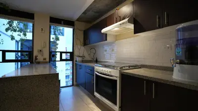 Una cocina o zona de cocina en Skyline y terraza privada Penthouse en CDMX