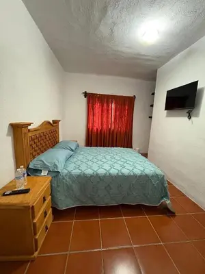 Cama o camas de una habitación en casa los sabinos