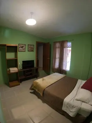 Cama o camas de una habitación en Casa León