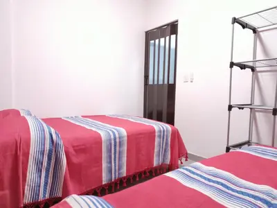 Cama o camas de una habitación en Casa Alianza Jalatlaco