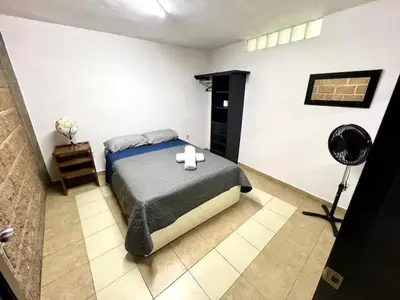 Cama o camas de una habitación en Edificio Rosedal 2