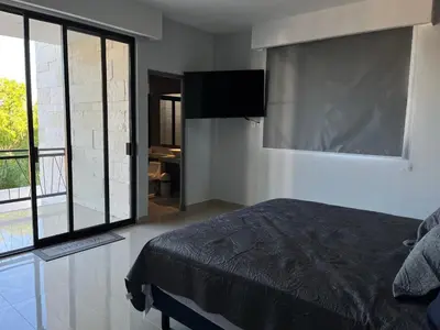 Cama o camas de una habitación en Casa Privada Acapulco