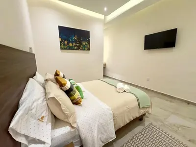 Una televisión o centro de entretenimiento en Loft Santorino 5 en Valquirico