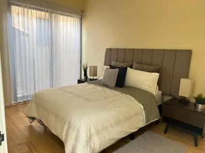 Cama o camas de una habitación en Penthouse Santorino en Valquirico