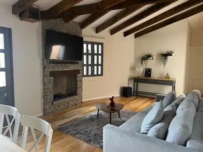 Zona de estar de Penthouse Santorino en Valquirico