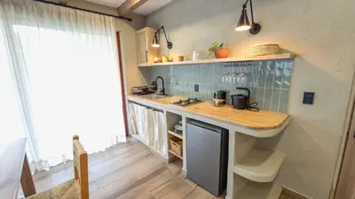 Una cocina o zona de cocina en Boscana Forest Resort & Residence