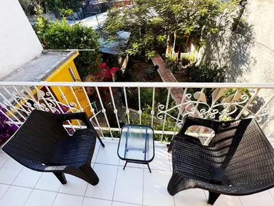 Un balcón o terraza de Recamara pribada amplia muy linda