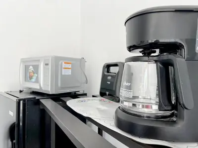 Una cocina o zona de cocina en Recamara pribada amplia muy linda