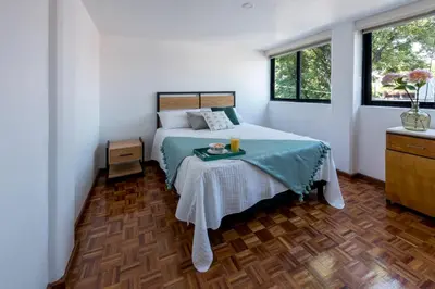 Cama o camas de una habitación en Departamento en Coyoacán 7
