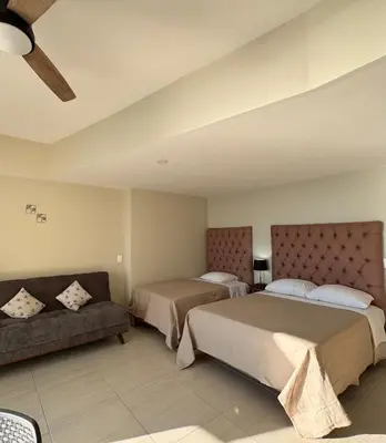 Cama o camas de una habitación en Suite Torres Gemelas Acapulco