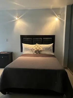 Cama o camas de una habitación en SOFIA Hotel