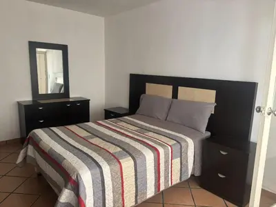 Cama o camas de una habitación en SOFIA Hotel