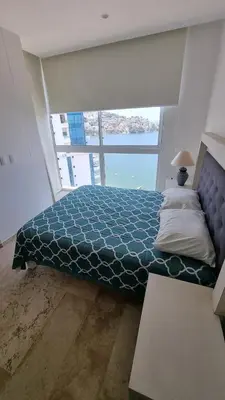 Cama o camas de una habitación en Alojamiento armandos le club piso 20