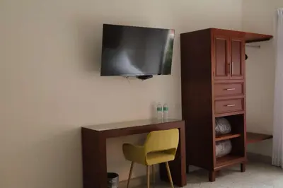 Una televisión o centro de entretenimiento en Casa San José
