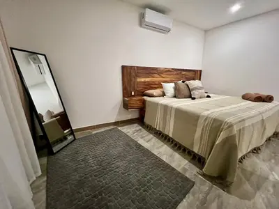 Cama o camas de una habitación en Departamentos Huitzilin