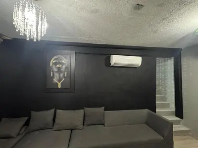 Zona de estar de Habitación cómoda para su estancia