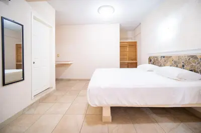Cama o camas de una habitación en HOTEL PENÍNSULA Salina Cruz