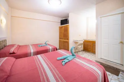 Cama o camas de una habitación en HOTEL PENÍNSULA Salina Cruz