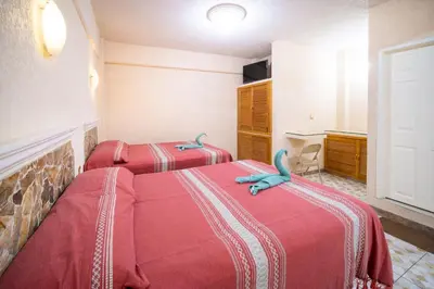 Cama o camas de una habitación en HOTEL PENÍNSULA Salina Cruz