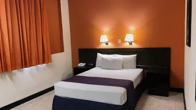 Cama o camas de una habitación en HOTEL ValgrandE