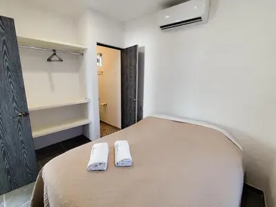 Cama o camas de una habitación en Fraccionamiento Puerta al Sol Acapulco