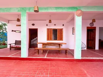 Zona de estar de Bonita casa cerca de la playa