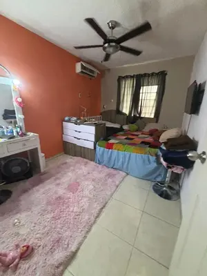 Una televisión o centro de entretenimiento en Casa Mochila