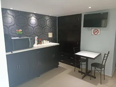 Una cocina o zona de cocina en Hotel Ejecutivo Express Paraiso