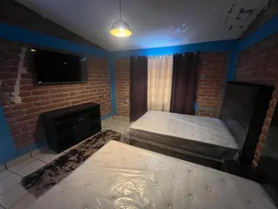 Cama o camas de una habitación en Hotel La Gavia