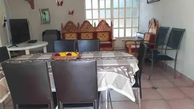 Una televisión o centro de entretenimiento en Rest house Yautepec Bonito Private