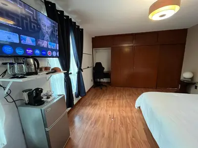 Cama o camas de una habitación en SúperAnfitrión Coyoacán King 1