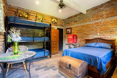 Cama o camas de una habitación en Cozy House with Pool and 3 Bedrooms