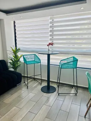 Zona de estar de SUITE INTI vista al mar