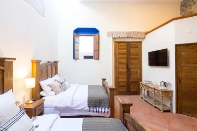 Cama o camas de una habitación en Mágica Suit en Centro Histórico