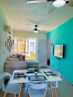 Una televisión o centro de entretenimiento en Departamento Acapulco Diamante
