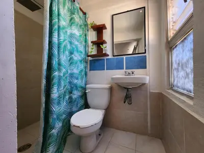 Un baño de Habitaciones Nava
