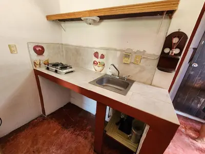 Una cocina o zona de cocina en Habitaciones Nava