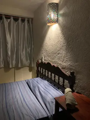 Cama o camas de una habitación en Habitaciones Nava